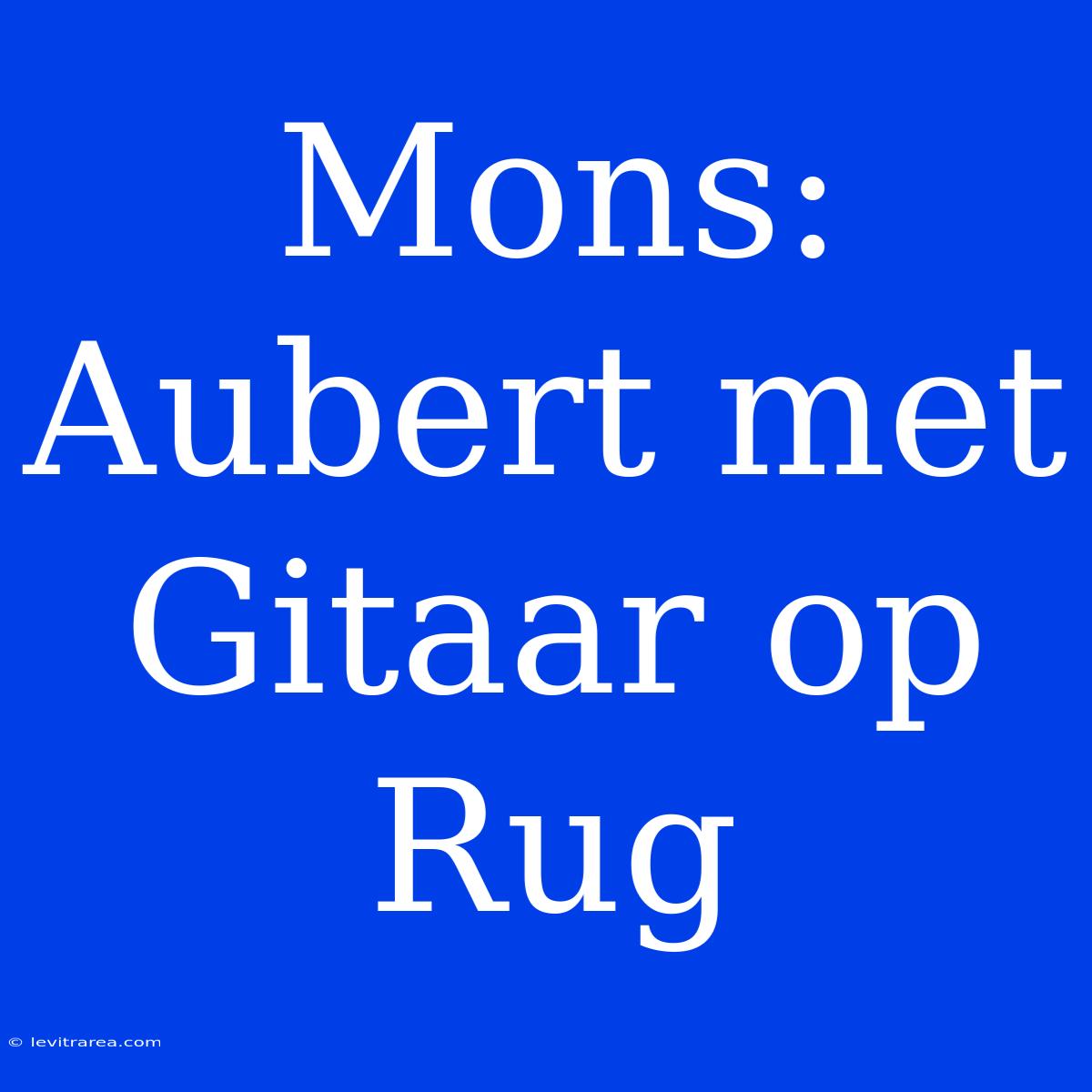 Mons: Aubert Met Gitaar Op Rug